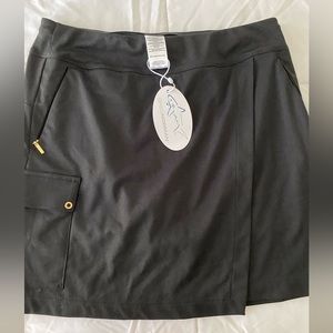 Black size Small golf skirt with zipper pockets by GregNorman.